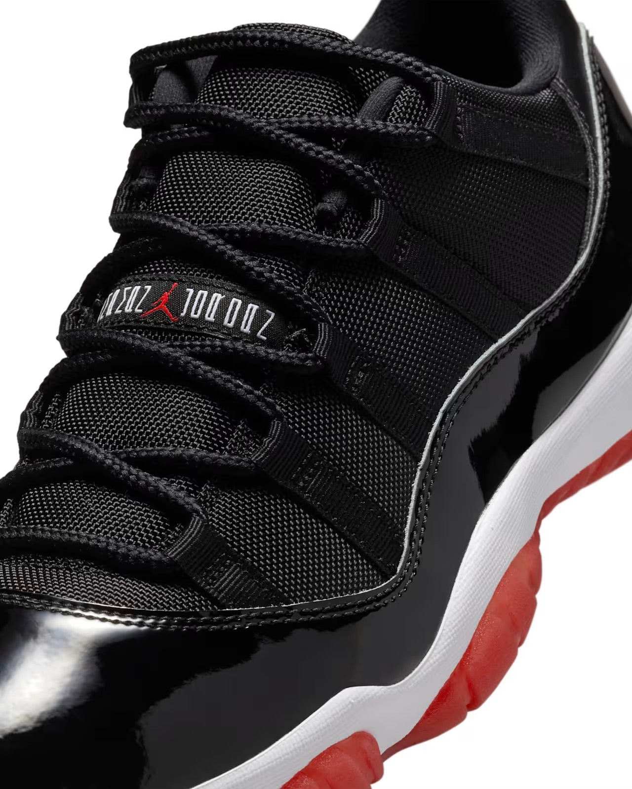 Jordan 11 Low “Bred”