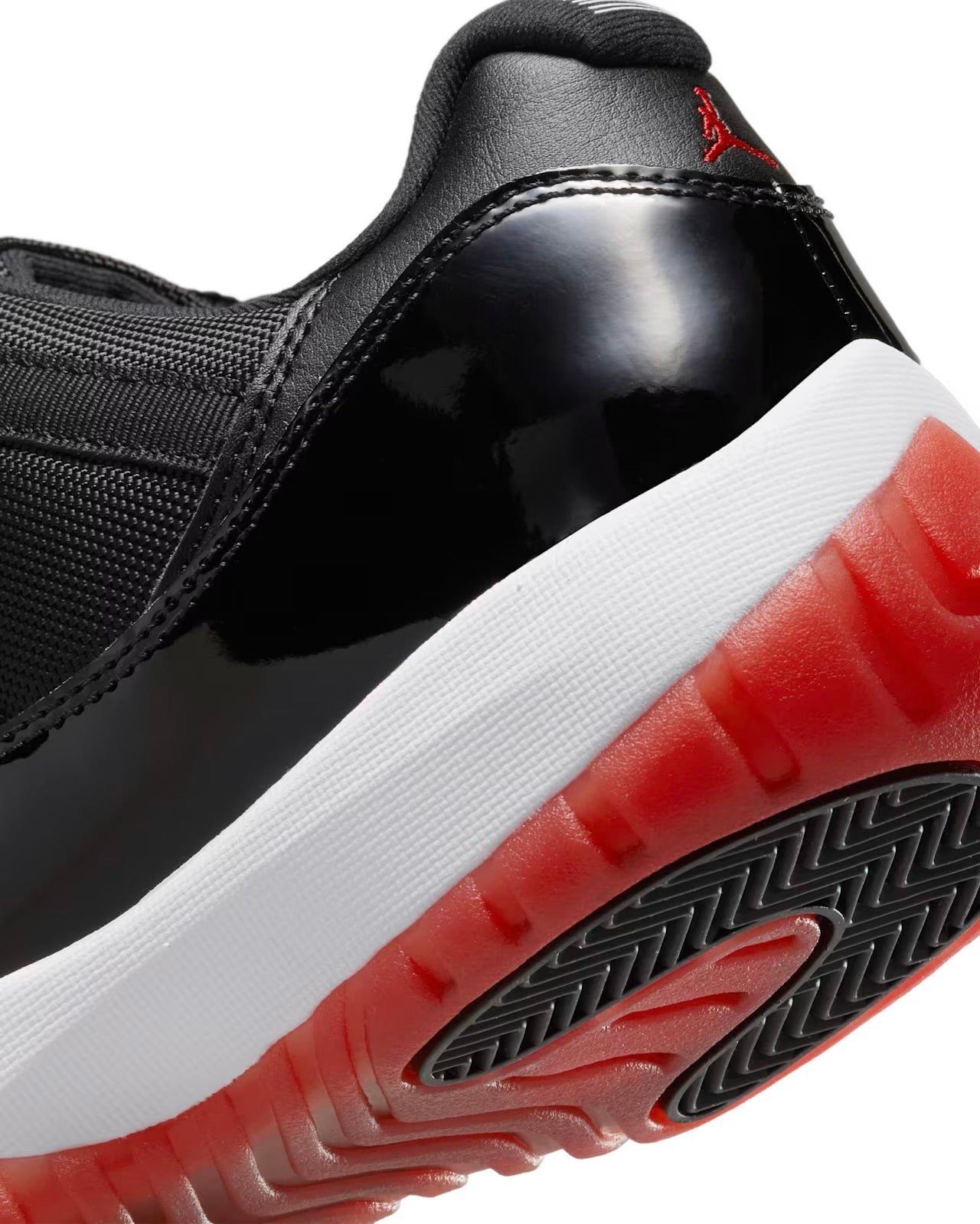 Jordan 11 Low “Bred”