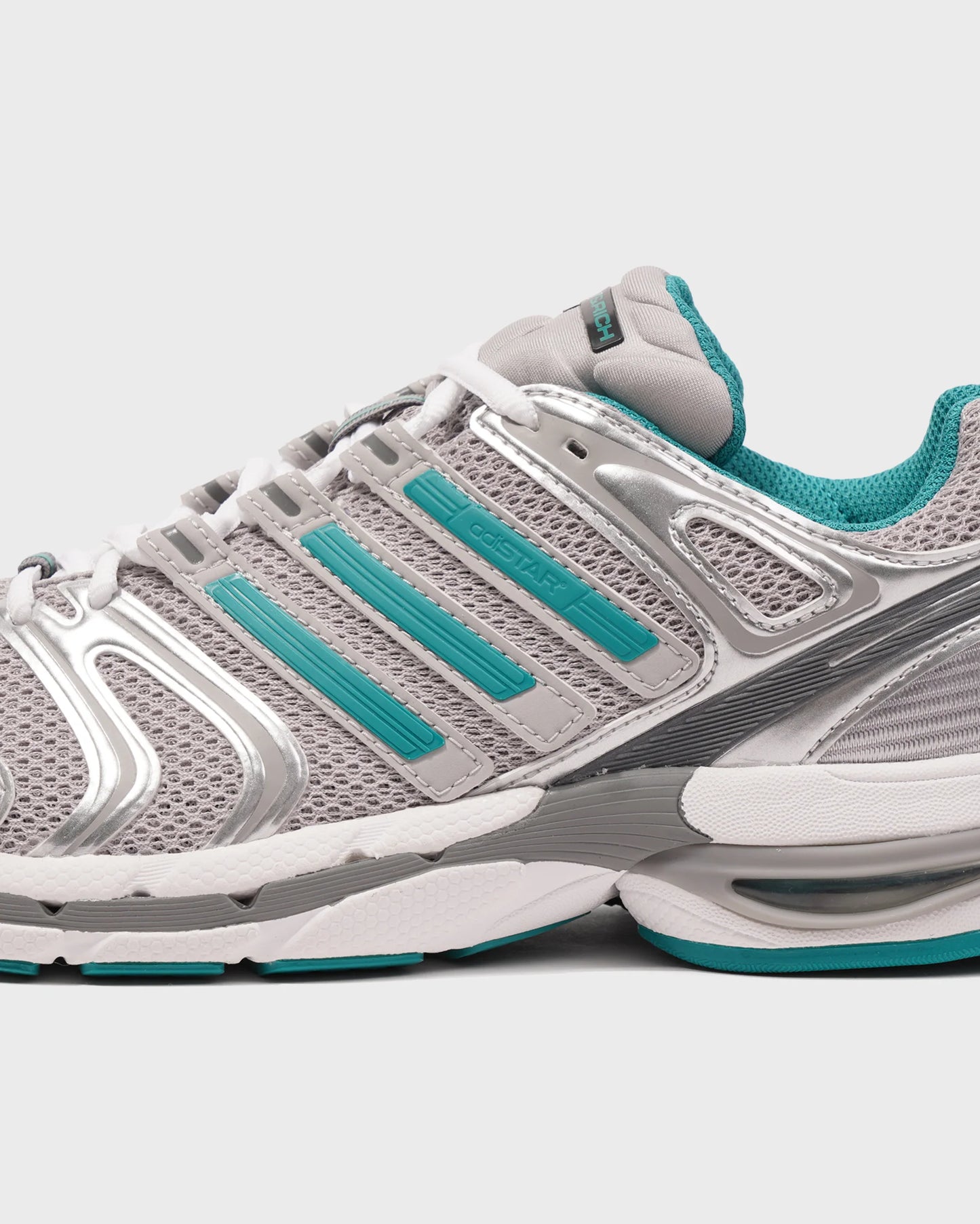 Adidas x Sporty and Rich Adistar Control 5 “Metallic Silver”